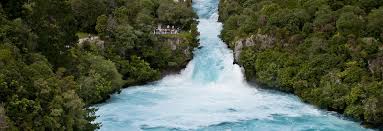 Turquoise water surging through the narrow gorge at Huka Falls near Taupo